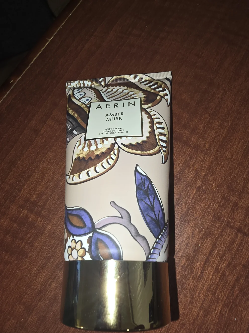 Aerin Amber Musk Body Cream — Beige Tube with Gold and Navy Accents